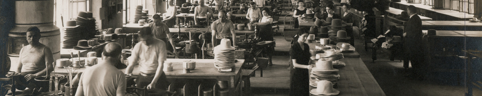 Immagine di testata: estratto foto storica Archivio Fototeca civica Città di Alessandria, Fondo Borsalino – Reparti di lavorazione